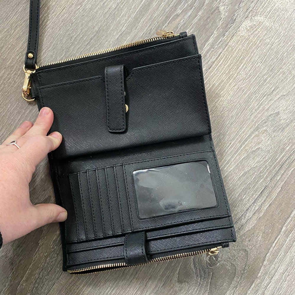 Black wristlet with spot for phone,cards etc